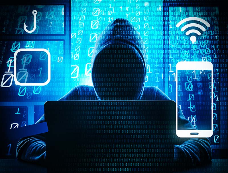 Phishing Hacker In Hoodie On Computer